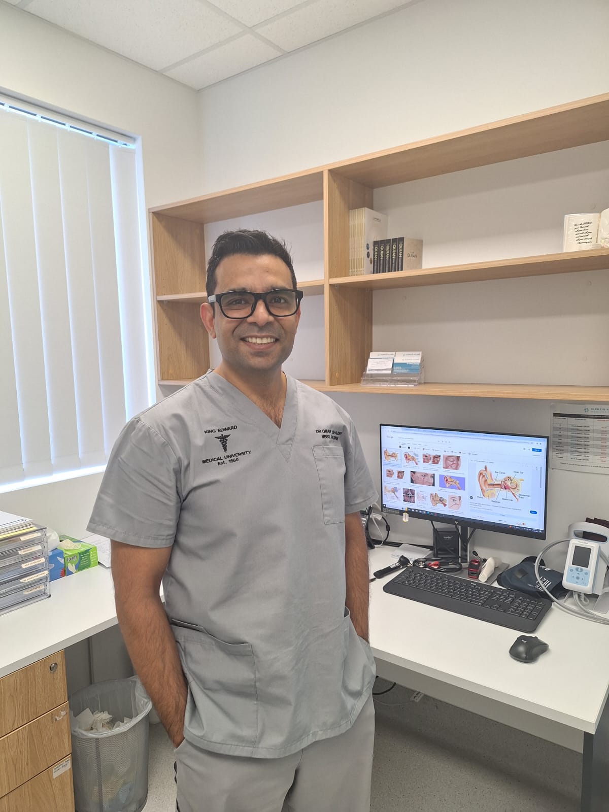 Dr. Omair Chaudry in his consulting room.